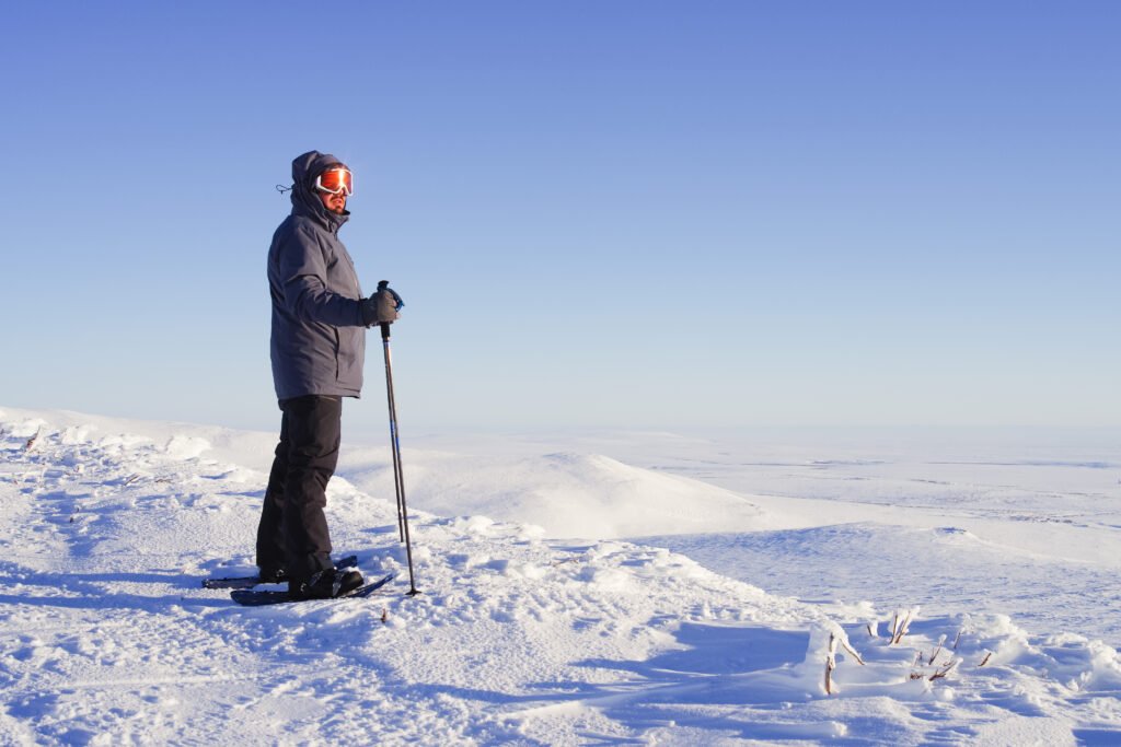 Photo Credit: Bradley Larrison on Pentax K-1 Lens: smc PENTAX-FA 77mm F1.8 Limited
Dr. Gustaveson standing at the top of Anvil Mountain.